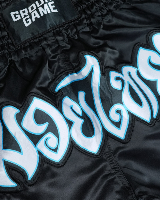 Pantalonii scurți Muay Thai Cheeky Monkey Ground Game