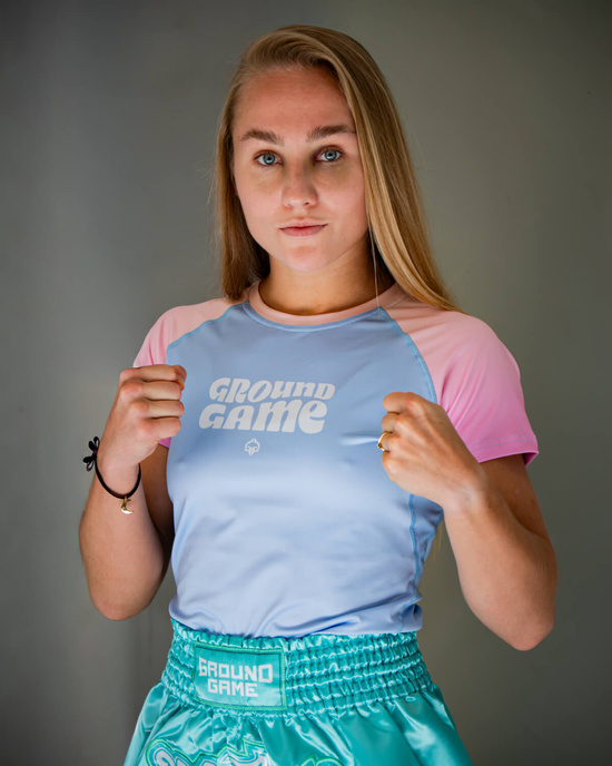 Rashguard pentru femei cu mâneci scurte Athletic Light Blue Ground Game