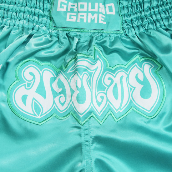 Pantalonii scurți Muay Thai pentru femei Lotus Ground Game